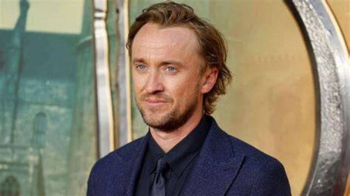 Harry Potter star Tom Felton takes his dog for a walk in London with