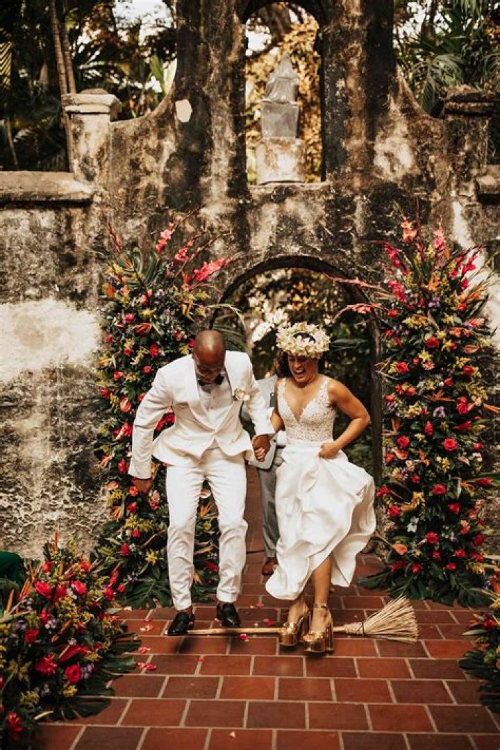 Jumping the Broom from Best Movie Wedding Dresses of All Time E! News